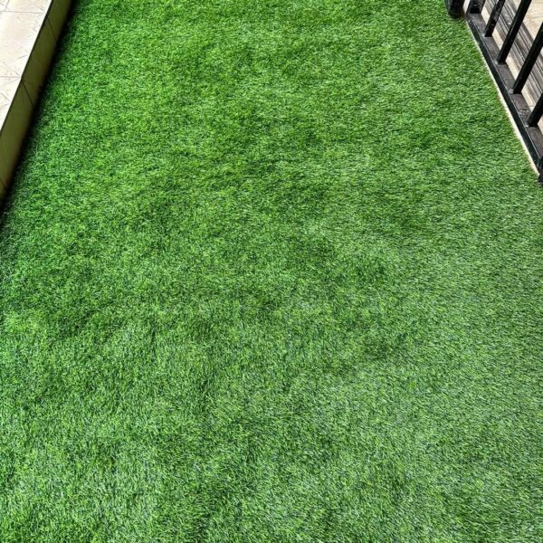 Enhance your outdoor or indoor spaces with our premium Artificial Grass Carpet in Kenya from Dream Sphere Interiors — the perfect blend of beauty, durability, and convenience. Designed to transform any area into a lush, green paradise, our synthetic grass provides a natural look that lasts all year round without the hassle of watering, mowing, or fertilizing.  Ideal for homes, schools, playgrounds, nightclubs, restaurants, and commercial spaces, our artificial grass is engineered to withstand heavy foot traffic while maintaining a soft, natural texture. It’s anti-slip, water-permeable, and built with UV-resistant fibers, ensuring long-lasting color and performance in all weather conditions.  Whether you’re creating a relaxing garden retreat or upgrading a high-use area, our Artificial Grass Carpet in Kenya delivers comfort, safety, and style. It’s particularly suitable for children’s play areas, offering a cushioned, safe, and mess-free surface.  Product Specifications  Roll Dimensions: 2 meters wide × 35 meters long (cut to required size)  Thickness Options: 15mm, 20mm, 25mm, 30mm, 35mm  Pricing  15mm – KSh 1,000 per SQM  20mm – KSh 1,200 per SQM  25mm – KSh 1,500 per SQM  30mm – KSh 1,600 per SQM  35mm – KSh 1,800 per SQM  How to Order  Measure your area (length × width) and contact us for a customized quote, including supply and professional installation.  Let Dream Sphere Interiors bring life to your lawns, balconies, and recreational areas with our premium Artificial Grass Carpet in Kenya — where beauty meets durability. - Image 2