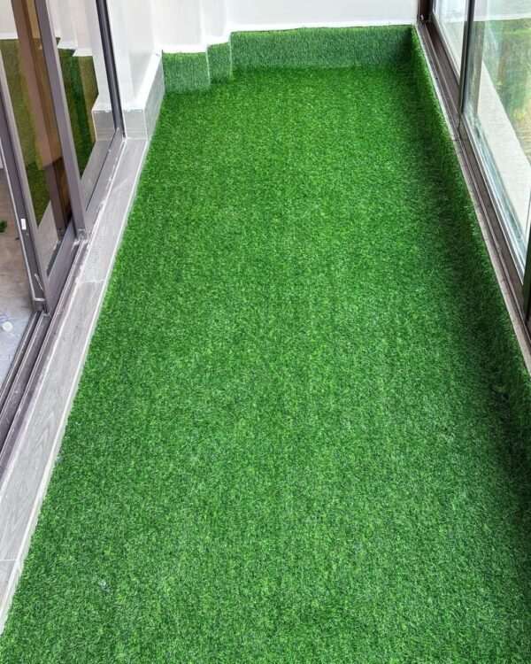 Enhance your outdoor or indoor spaces with our premium Artificial Grass Carpet in Kenya from Dream Sphere Interiors — the perfect blend of beauty, durability, and convenience. Designed to transform any area into a lush, green paradise, our synthetic grass provides a natural look that lasts all year round without the hassle of watering, mowing, or fertilizing.  Ideal for homes, schools, playgrounds, nightclubs, restaurants, and commercial spaces, our artificial grass is engineered to withstand heavy foot traffic while maintaining a soft, natural texture. It’s anti-slip, water-permeable, and built with UV-resistant fibers, ensuring long-lasting color and performance in all weather conditions.  Whether you’re creating a relaxing garden retreat or upgrading a high-use area, our Artificial Grass Carpet in Kenya delivers comfort, safety, and style. It’s particularly suitable for children’s play areas, offering a cushioned, safe, and mess-free surface.  Product Specifications  Roll Dimensions: 2 meters wide × 35 meters long (cut to required size)  Thickness Options: 15mm, 20mm, 25mm, 30mm, 35mm  Pricing  15mm – KSh 1,000 per SQM  20mm – KSh 1,200 per SQM  25mm – KSh 1,500 per SQM  30mm – KSh 1,600 per SQM  35mm – KSh 1,800 per SQM  How to Order  Measure your area (length × width) and contact us for a customized quote, including supply and professional installation.  Let Dream Sphere Interiors bring life to your lawns, balconies, and recreational areas with our premium Artificial Grass Carpet in Kenya — where beauty meets durability. - Image 10