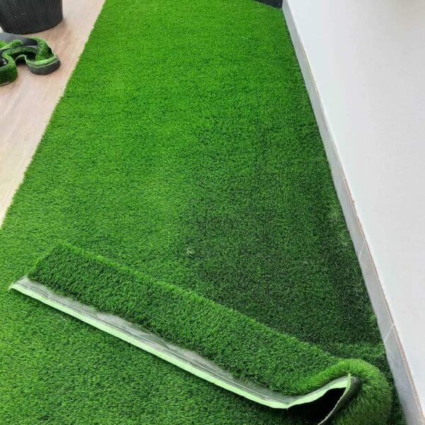 Enhance your outdoor or indoor spaces with our premium Artificial Grass Carpet in Kenya from Dream Sphere Interiors — the perfect blend of beauty, durability, and convenience. Designed to transform any area into a lush, green paradise, our synthetic grass provides a natural look that lasts all year round without the hassle of watering, mowing, or fertilizing.  Ideal for homes, schools, playgrounds, nightclubs, restaurants, and commercial spaces, our artificial grass is engineered to withstand heavy foot traffic while maintaining a soft, natural texture. It’s anti-slip, water-permeable, and built with UV-resistant fibers, ensuring long-lasting color and performance in all weather conditions.  Whether you’re creating a relaxing garden retreat or upgrading a high-use area, our Artificial Grass Carpet in Kenya delivers comfort, safety, and style. It’s particularly suitable for children’s play areas, offering a cushioned, safe, and mess-free surface.  Product Specifications  Roll Dimensions: 2 meters wide × 35 meters long (cut to required size)  Thickness Options: 15mm, 20mm, 25mm, 30mm, 35mm  Pricing  15mm – KSh 1,000 per SQM  20mm – KSh 1,200 per SQM  25mm – KSh 1,500 per SQM  30mm – KSh 1,600 per SQM  35mm – KSh 1,800 per SQM  How to Order  Measure your area (length × width) and contact us for a customized quote, including supply and professional installation.  Let Dream Sphere Interiors bring life to your lawns, balconies, and recreational areas with our premium Artificial Grass Carpet in Kenya — where beauty meets durability. - Image 14