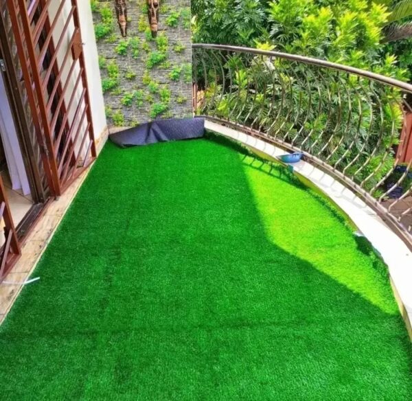 Enhance your outdoor or indoor spaces with our premium Artificial Grass Carpet in Kenya from Dream Sphere Interiors — the perfect blend of beauty, durability, and convenience. Designed to transform any area into a lush, green paradise, our synthetic grass provides a natural look that lasts all year round without the hassle of watering, mowing, or fertilizing.  Ideal for homes, schools, playgrounds, nightclubs, restaurants, and commercial spaces, our artificial grass is engineered to withstand heavy foot traffic while maintaining a soft, natural texture. It’s anti-slip, water-permeable, and built with UV-resistant fibers, ensuring long-lasting color and performance in all weather conditions.  Whether you’re creating a relaxing garden retreat or upgrading a high-use area, our Artificial Grass Carpet in Kenya delivers comfort, safety, and style. It’s particularly suitable for children’s play areas, offering a cushioned, safe, and mess-free surface.  Product Specifications  Roll Dimensions: 2 meters wide × 35 meters long (cut to required size)  Thickness Options: 15mm, 20mm, 25mm, 30mm, 35mm  Pricing  15mm – KSh 1,000 per SQM  20mm – KSh 1,200 per SQM  25mm – KSh 1,500 per SQM  30mm – KSh 1,600 per SQM  35mm – KSh 1,800 per SQM  How to Order  Measure your area (length × width) and contact us for a customized quote, including supply and professional installation.  Let Dream Sphere Interiors bring life to your lawns, balconies, and recreational areas with our premium Artificial Grass Carpet in Kenya — where beauty meets durability. - Image 18